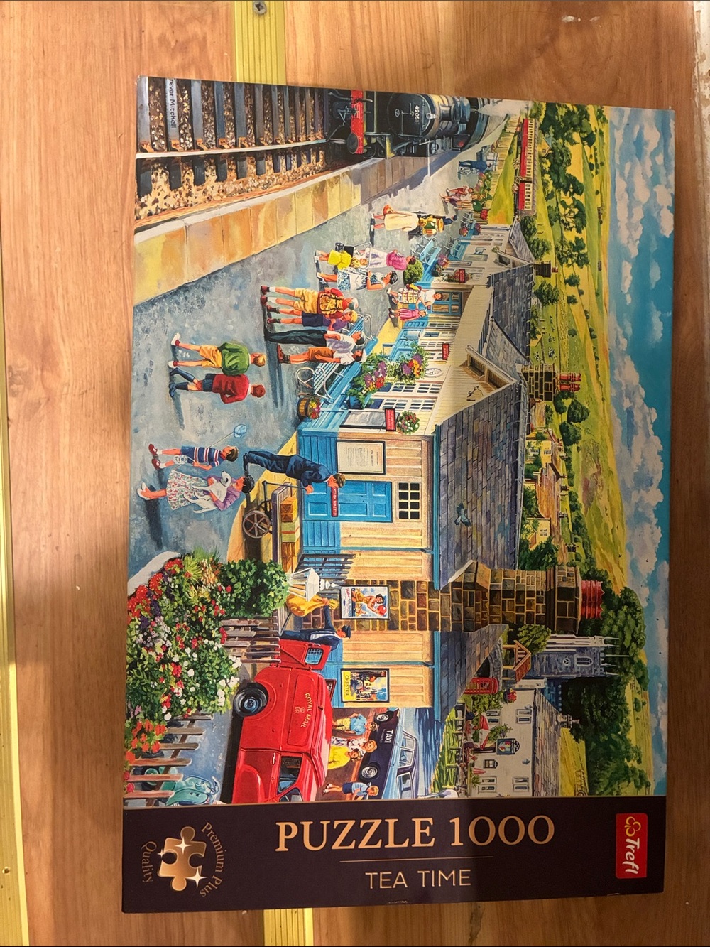 Tea Time 1000-Piece Puzzle — Colorful Village Station Scene
